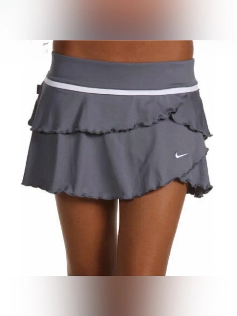 Nike Women's Gray Ruffle Tennis Skort with Contrast Trim. Look good on the court